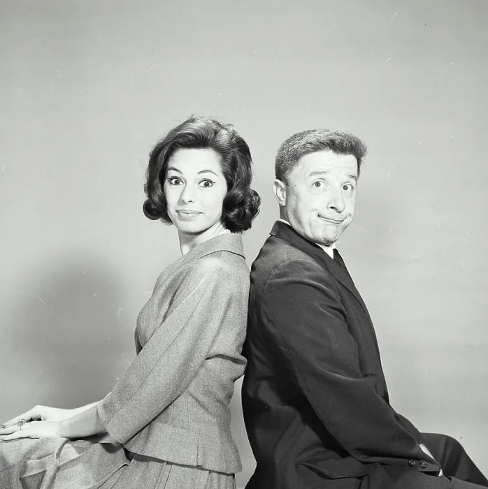 Framed Print : Vintage Photograph. Young couple back to back with smug expression Framed Print : Vintage Photograph. Young couple back to back with smug expression