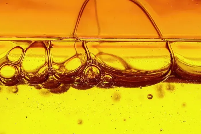 Framed Print : A viscous yellow liquid with air bubbles Framed Print : A viscous yellow liquid with air bubbles