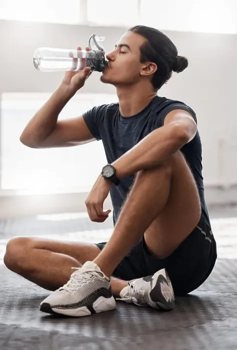 Framed Print : Water bottle, fitness and gym man tired after a fitness training Framed Print : Water bottle, fitness and gym man tired after a fitness training