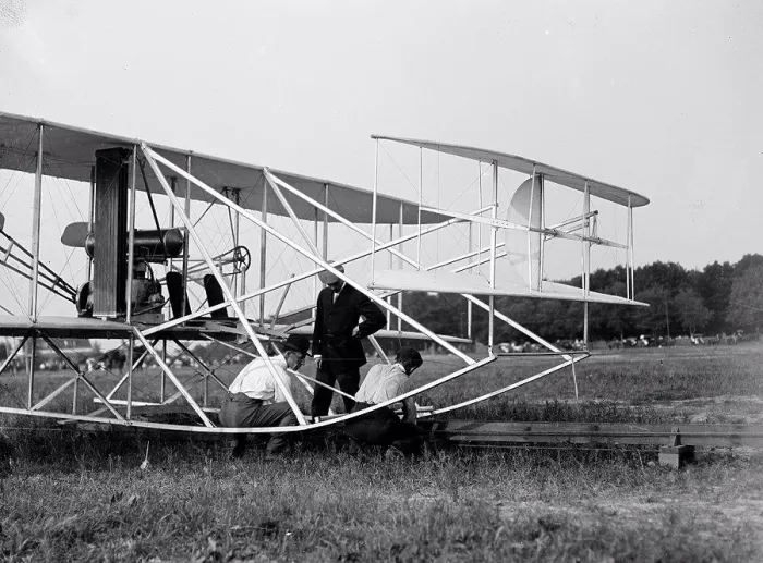Framed Print : Wilbur Wright, Orville Wright and Charlie Taylor putting the plane on launching rail Fort Myer Virginia circa 1909 Framed Print : Wilbur Wright, Orville Wright and Charlie Taylor putting the plane on launching rail Fort Myer Virginia circa 1909