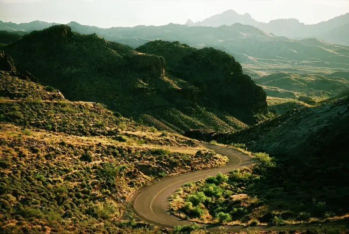 Framed Print : Winding road passing through mountains Framed Print : Winding road passing through mountains