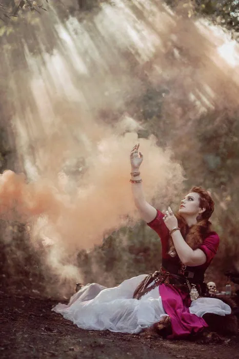 Framed Print : Witch with short hair in dress against the background of wild nature Framed Print : Witch with short hair in dress against the background of wild nature