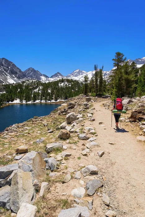 Framed Print : Woman backpacking along Box Lake in Little Lakes Valley, John Muir Wilderness, California, USA (MR)