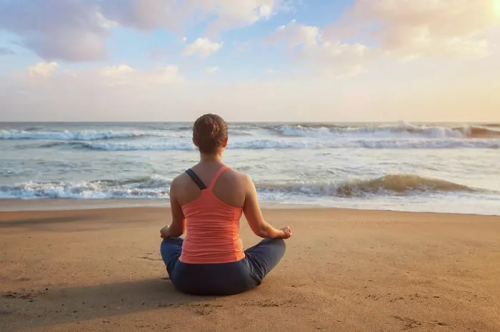 Framed Print : Woman doing yoga - meditating and relaxing in Padmasana Lotus Pose outdoors at tropical beach on sunset Framed Print : Woman doing yoga - meditating and relaxing in Padmasana Lotus Pose outdoors at tropical beach on sunset