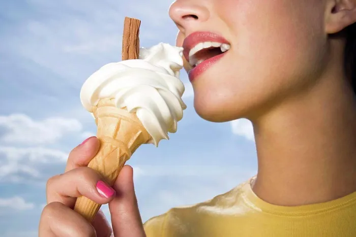 Framed Print : Woman eating ice cream Framed Print : Woman eating ice cream