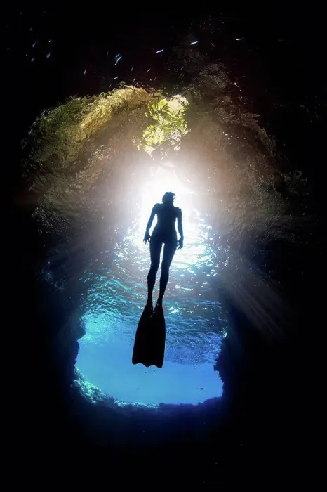 Framed Print : Woman free-diving, low angle view, Swallow Cave, Vavau, Tonga, Fiji Framed Print : Woman free-diving, low angle view, Swallow Cave, Vavau, Tonga, Fiji