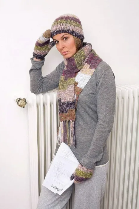 Framed Print : Woman holding utility bill, wearing scarf and cap Framed Print : Woman holding utility bill, wearing scarf and cap