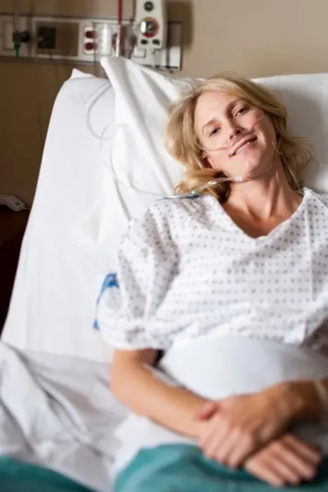 Framed Print : Woman in hospital bed