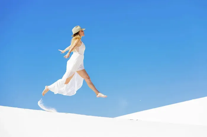 Framed Print : Woman jumping on the Gypsum Sand Dune, White Sands, New Mexico, United States of America, North America Framed Print : Woman jumping on the Gypsum Sand Dune, White Sands, New Mexico, United States of America, North America
