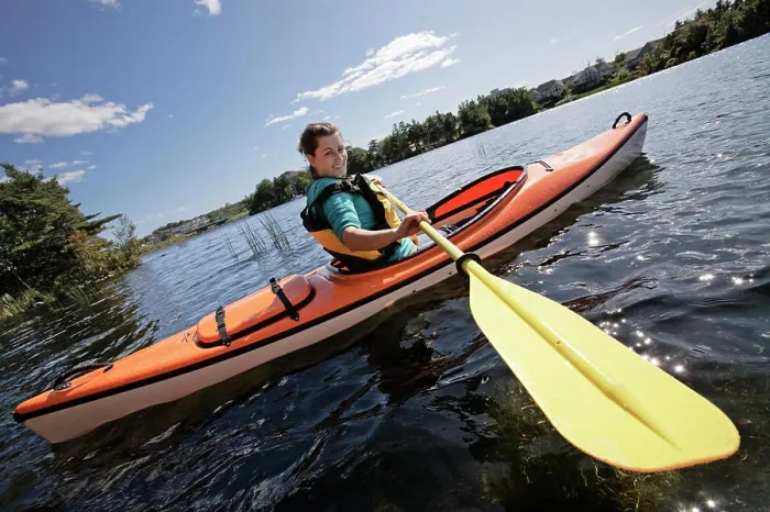 Framed Print : Woman kayaking on Lake Micmac in Dartmouth, Nova Scotia, part of Halifax Regional Municipality Framed Print : Woman kayaking on Lake Micmac in Dartmouth, Nova Scotia, part of Halifax Regional Municipality