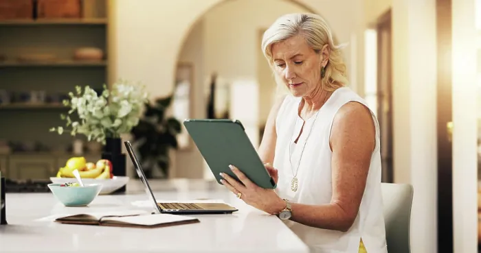 Framed Print : Woman, laptop and reading with tablet for project draft Framed Print : Woman, laptop and reading with tablet for project draft
