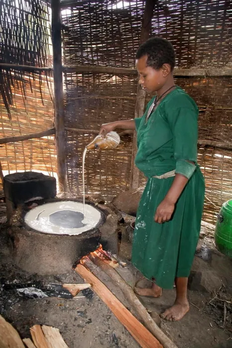 Framed Print : Woman making Injera, the staple diet, Ethiopia, Africa