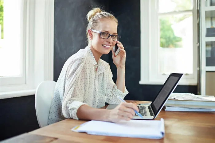 Framed Print : Woman, portrait and laptop in home office with phone call for business networking