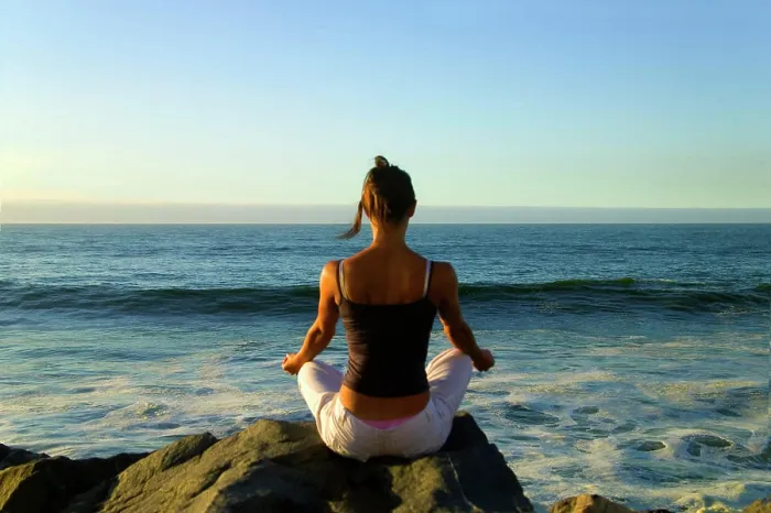 Framed Print : Woman pratice Yoga at sunrise on the beach, Vina del Mar, Chile