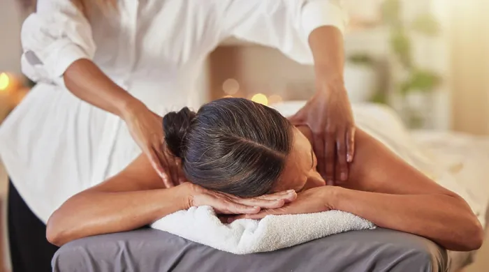 Framed Print : Woman at spa for massage with therapist and holistic treatment Framed Print : Woman at spa for massage with therapist and holistic treatment