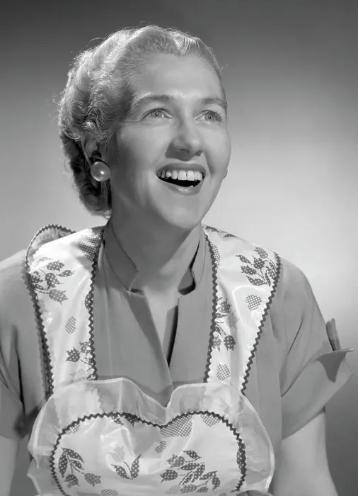 Framed Print : Woman wearing apron, smiling Framed Print : Woman wearing apron, smiling