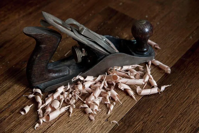 Framed Print : A wood planing tool and shavings Framed Print : A wood planing tool and shavings