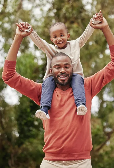 Framed Print : A young black father playing with his daughter happy Framed Print : A young black father playing with his daughter happy