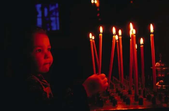 Framed Print : Young girl worshipper with candles, Orthodox Church, Joensuu, Finland. 30, 000 plus total European images Framed Print : Young girl worshipper with candles, Orthodox Church, Joensuu, Finland. 30, 000 plus total European images