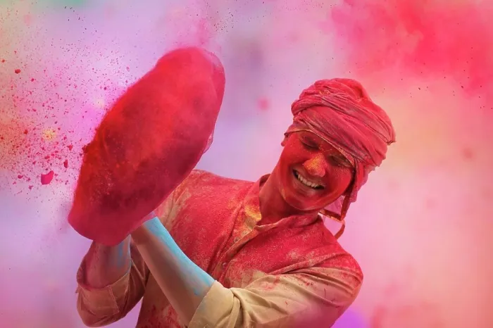 Framed Print : A YOUNG MAN STANDING AND CHEERFULLY PLAYING HOLI Framed Print : A YOUNG MAN STANDING AND CHEERFULLY PLAYING HOLI