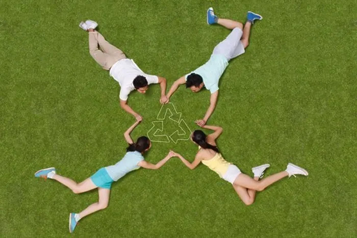 Framed Print : Young people lying on grass hand in hand Framed Print : Young people lying on grass hand in hand