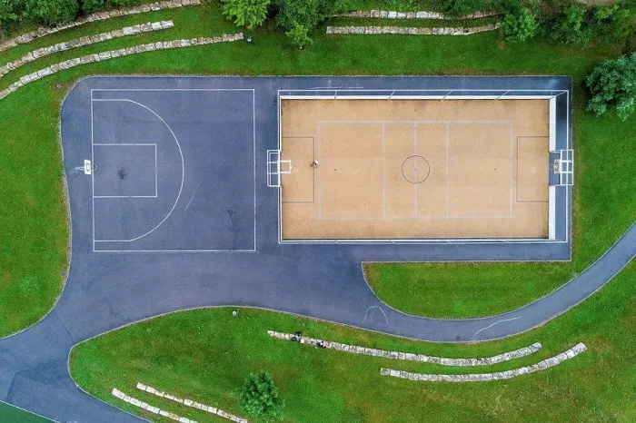 Framed Print : Young woman playing basketball, aerial view Framed Print : Young woman playing basketball, aerial view