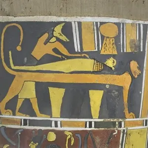 Egypt, Saqqara necropolis, Detail of cartonnage, embalmer and mummified person on lion-shaped table Egypt, Saqqara necropolis, Detail of cartonnage, embalmer and mummified person on lion-shaped table