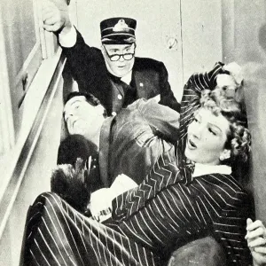 Film still from Family Honeymoon starring Fred MacMurray, Claudette Colbert, Rita Johnson, and Peter Mills Film still from Family Honeymoon starring Fred MacMurray, Claudette Colbert, Rita Johnson, and Peter Mills