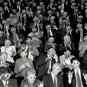 Group of people in a theater wearing 3-D glasses Group of people in a theater wearing 3-D glasses