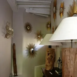 Hall Of A House, With Decorative Sun Mirrors Hall Of A House, With Decorative Sun Mirrors