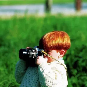 Ireland, Boy taking a picture