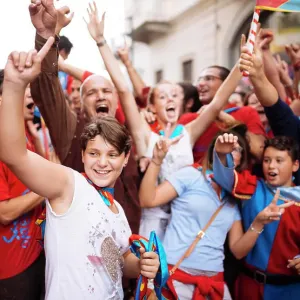 Joyful crowd celebrating a victory on the streets Joyful crowd celebrating a victory on the streets