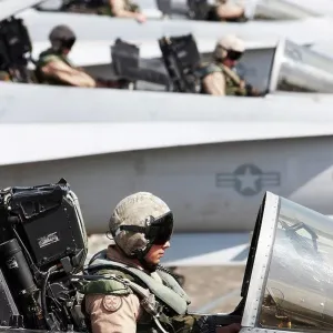 Malaysia, Kuantan Air Base, United States Marine Corps aviators in cockpits of Marine Corps F/A-18D Hornets Malaysia, Kuantan Air Base, United States Marine Corps aviators in cockpits of Marine Corps F/A-18D Hornets
