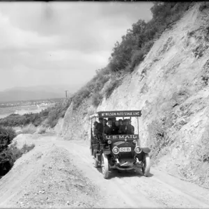 MT. WILSON AUTO STAGE LINE/MAIL TRUCK ASCENDING MT. WILSON TOLL ROAD WITH LOAD OF PEOPLE MT. WILSON AUTO STAGE LINE/MAIL TRUCK ASCENDING MT. WILSON TOLL ROAD WITH LOAD OF PEOPLE