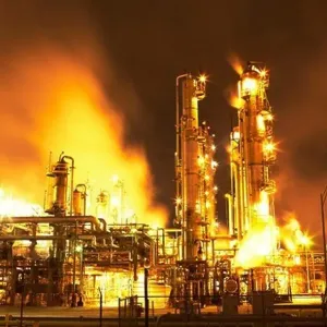 Night view of fluid catalytic cracking unit at a petroleum processing facility, Pasadena, Houston, Texas, USA Night view of fluid catalytic cracking unit at a petroleum processing facility, Pasadena, Houston, Texas, USA