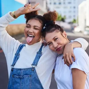 Were off to that white and denim party. two young woman out in the city during the day Were off to that white and denim party. two young woman out in the city during the day
