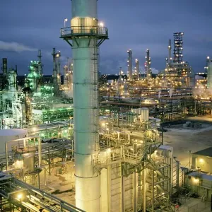 Oil Refinery lit up at night, Texas, USA Oil Refinery lit up at night, Texas, USA