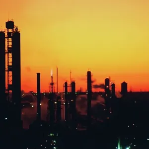 Silhouette of an oil refinery at sunset Silhouette of an oil refinery at sunset