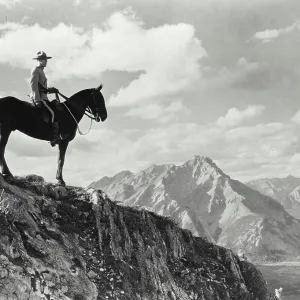 Vintage photograph. A Royal Canadian Mounted Police constable atop Sulphur Mountain in Banff National Park Vintage photograph. A Royal Canadian Mounted Police constable atop Sulphur Mountain in Banff National Park