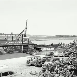 Vintage Photograph. Vehicle parking on coast of Mississippi River Vintage Photograph. Vehicle parking on coast of Mississippi River