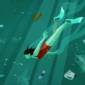 Woman swimming underwater in sea among pollution Woman swimming underwater in sea among pollution