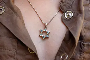 Jewellery Prints: A 10_year_old girl wearing Star of David jewelry, Hertzliya, Israel, Middle East