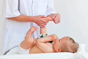 Alternative Therapy Prints: 17 months old baby receiving foot massage