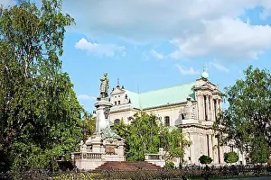 Writer Prints: 17th century Roman Catholic Carmelite Church and Adam Mickiewicz Polish Romantic poet statue in Warsaw