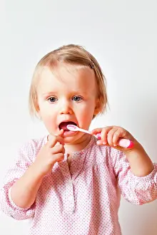 Tooth Prints: 18 month old baby girl brushing her teeth