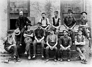 Manly Prints: 1890S 1900S Group Of 11 Factory Workers Seated Outside Of Building