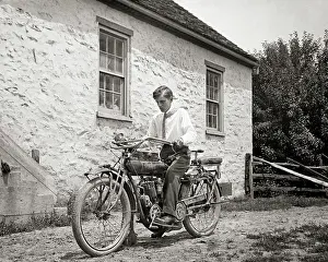 Anonymous Prints: 1910s ANONYMOUS YOUNG MAN WEARING WHITE SHIRT AND TIE SITTING ON INDIAN MOTORCYCLE CIRCA 1915