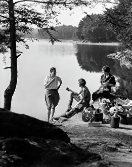 Hike Prints: 1920S 1930S 3 People Picnicking By Lake Man Wearing Jodhpurs Standing Two Seated Women Berkshires Ma Onata Lake