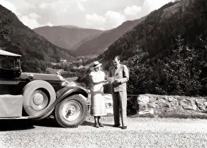 Autos Prints: 1920s 1930s MAN AND WOMAN PERHAPS LOST READING ROAD MAP STANDING BESIDE AUTOMOBILE NEAR FELDBERG IN BLACK FOREST OF