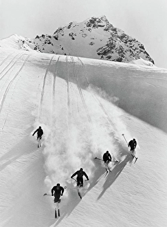 Powder Prints: 1920S 1930S Five Men Skiing Down Snow Covered Alps Switzerland